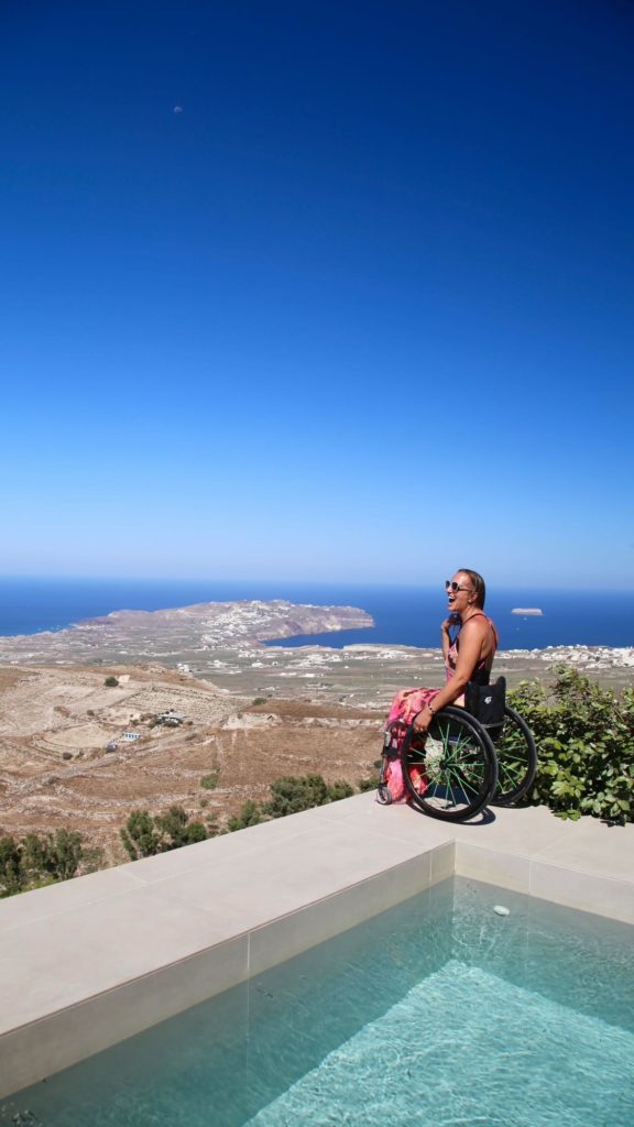 Wheelchair user at Santorini Sky accessible villa. The Inclusive Edit
