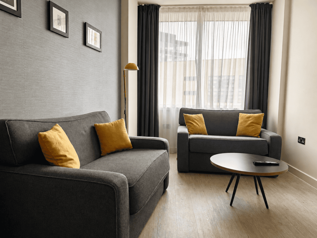Open-plan kitchen and dining area in the Staycity Manchester Piccadilly two-bedroom apartment.