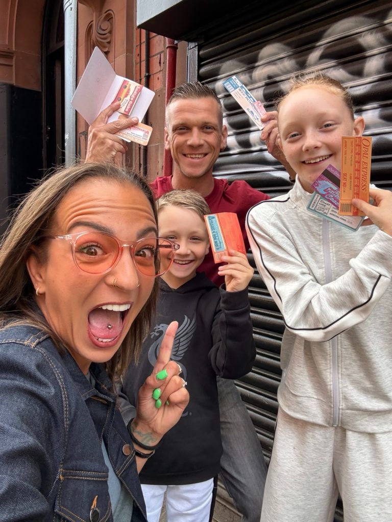 Family of four with their tickets for Race Across the World Experience | Manchester | Wheelchair accessible route