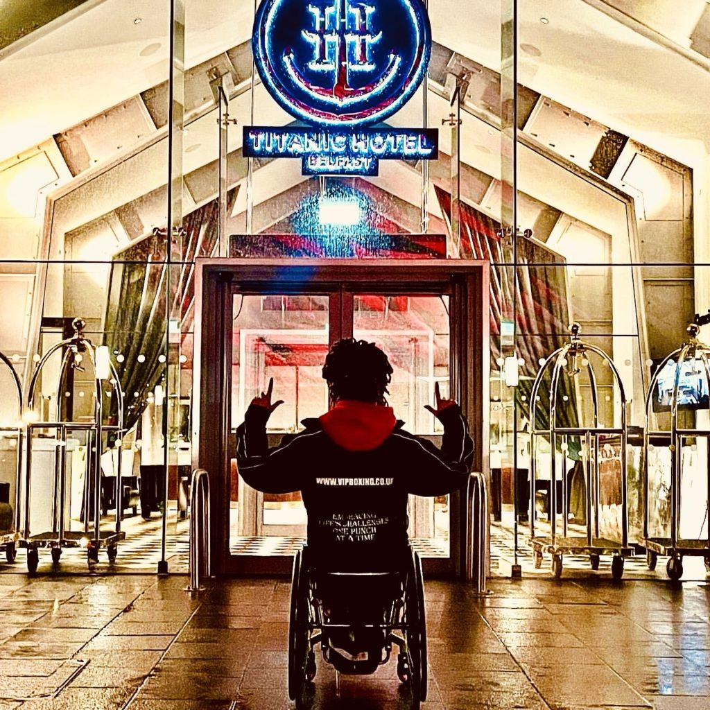 Luiz Faye at the entrance to Titanic Hotel Belfast.
